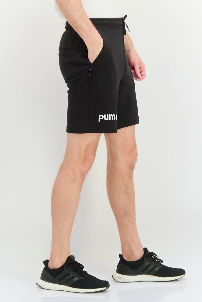 PUMA شورت تدريب للرجال بقصة مريحة بطول 8 إنش، أسود - Image 4