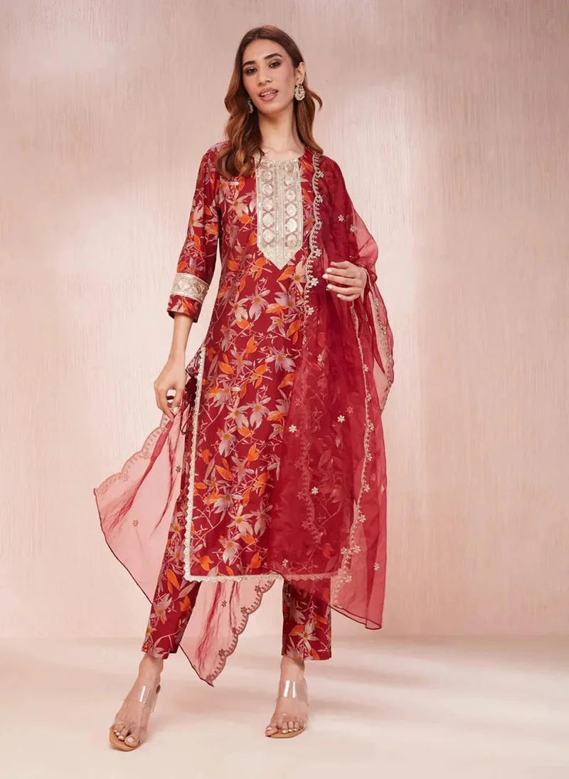 زيري سوق This is a Maroon Floral Print Straight Kurta Trouser And Dupatta SetFollowing are the Features of the product:-Kurta Design:-Sequins_Work on neckStraight ShapeThree quarter Regular SleevesRound NeckCalf LengthStraight HemTrouser Design:-Printed one pocket TrouserSlip-On WaistbandNOTE: Dupatta Length (Width 0.8 Mtr and length 2.20Mtr)