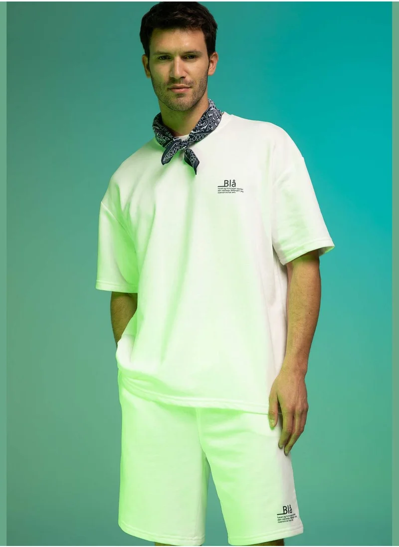 ديفاكتو Oversize Fit Short Sleeve Slogan Printed T-Shirt