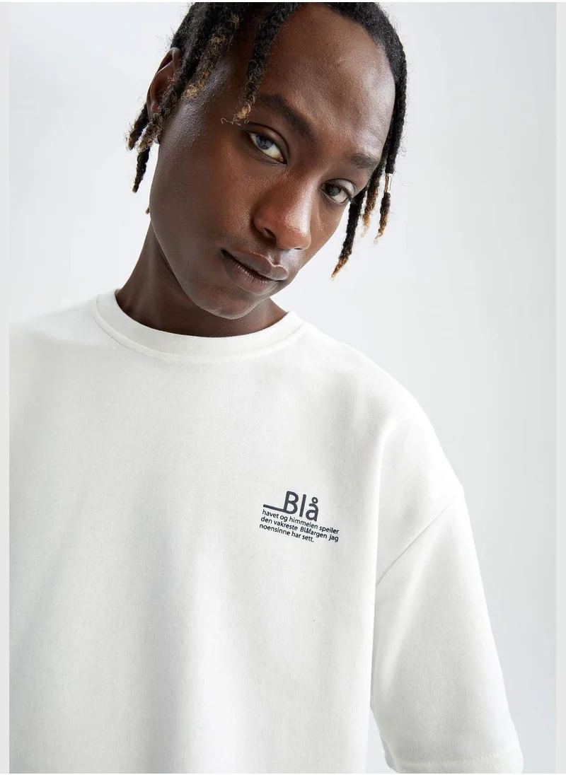 ديفاكتو Oversize Fit Short Sleeve Slogan Printed T-Shirt