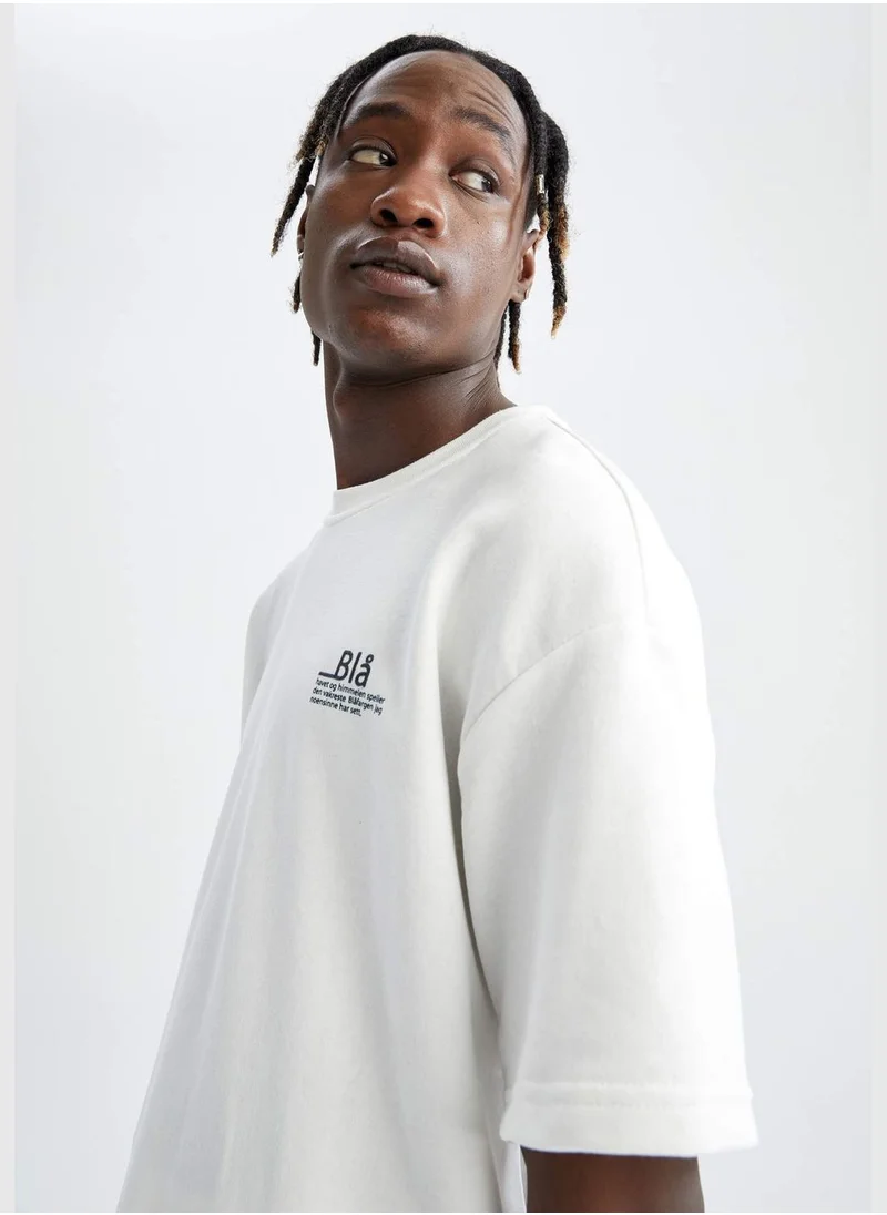 ديفاكتو Oversize Fit Short Sleeve Slogan Printed T-Shirt
