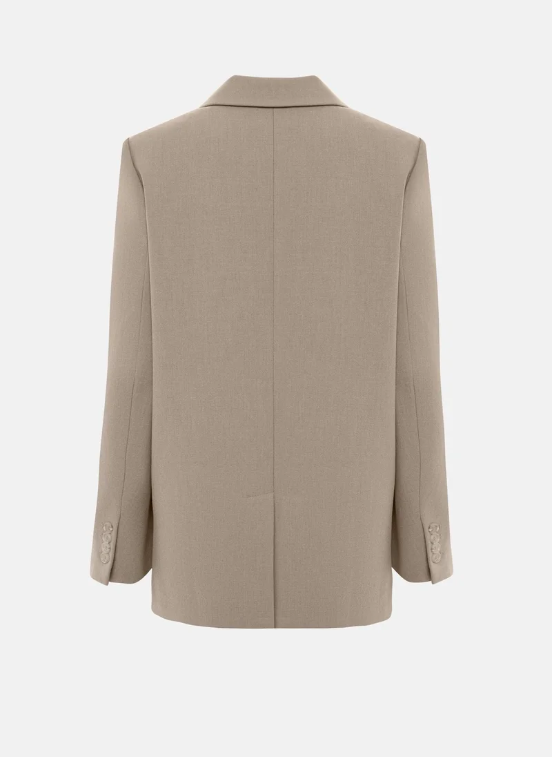 Lichi  Loose single-breasted jacket with asymmetrical fastening for Women | Best Price UAE