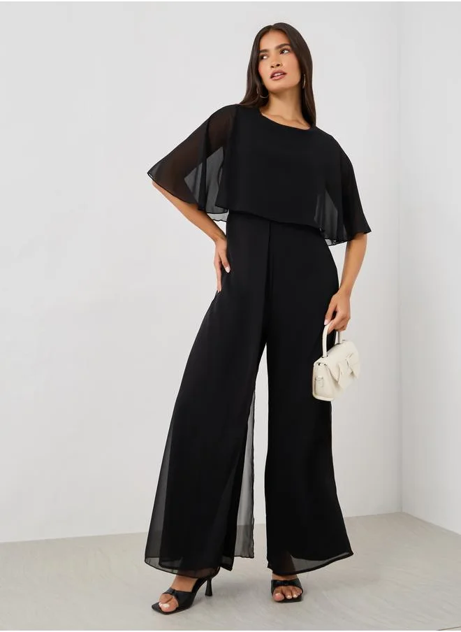 Styli Styli Solid Cape Sleeve Wide Leg Jumpsuit
