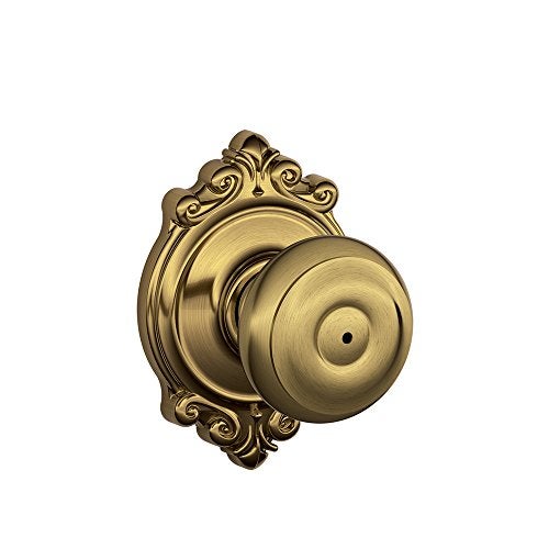 SCHLAGE F40 GEO 609 BRK Brookshire Collection Georgian Privacy Knob, Antique Brass - Image 1
