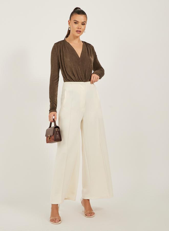 ستايلي بودي سوت بأكمام طويلة وتفاصيل مجمعة بلون موحد - Image 2