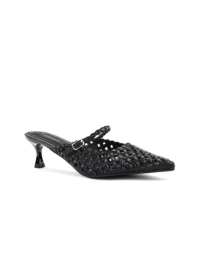 أيقون Classic Mary Jane heel Shoes with a stylish two-tone finish.