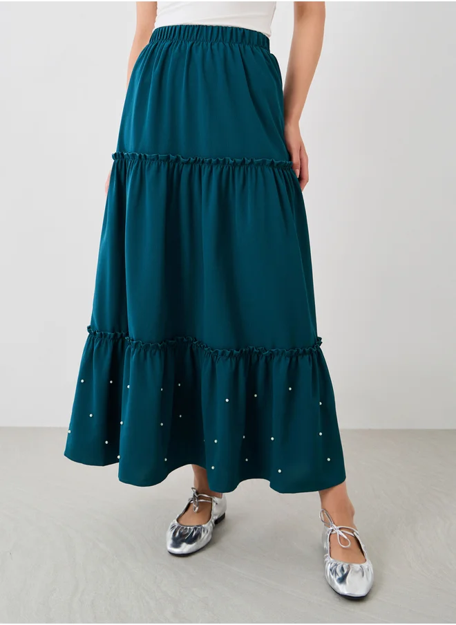 ستايلي Faux Pearl Embellished Hem A-Line Maxi Skirt
