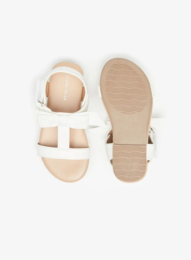 فلورا بيلا من شو إكسبرس Girl's Bow Applique Strap Sandals with Hook and Loop Closure