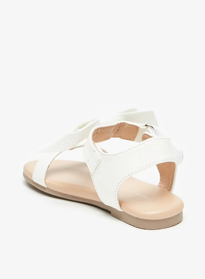 فلورا بيلا من شو إكسبرس Girl's Bow Applique Strap Sandals with Hook and Loop Closure