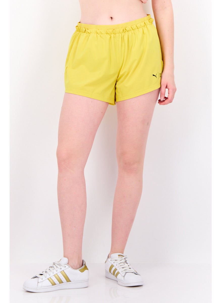 PUMA Women Sportswear Fit Outdoor Shorts, Yellow  - Image 1