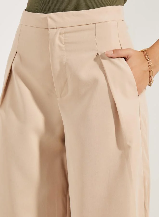 ستايلي Textured Wide Leg Ankle Length Pants