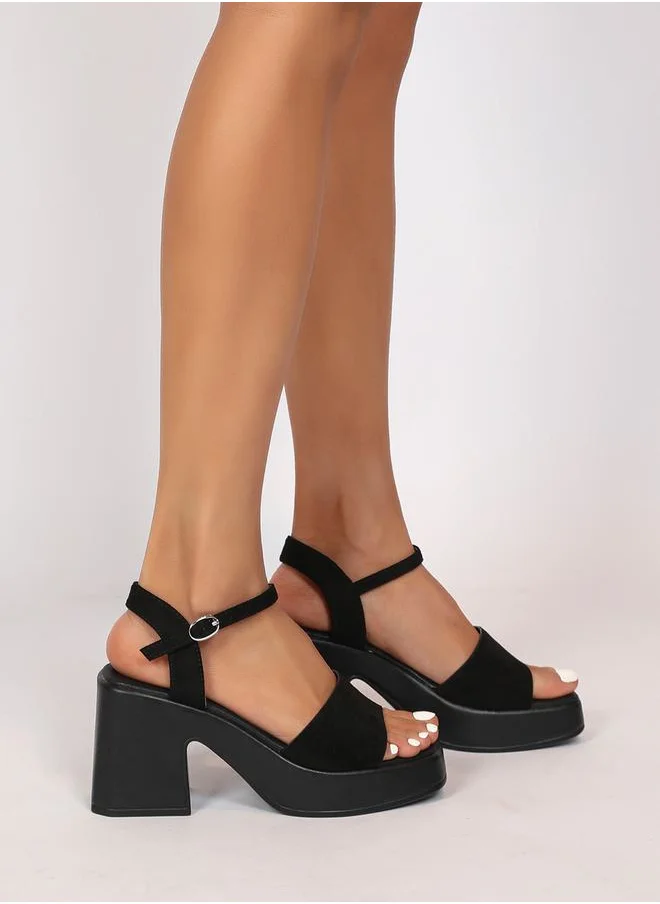 Sneak-a-Peek Ankle Strap Block Heel Sandals with Buckle Closure by Styli