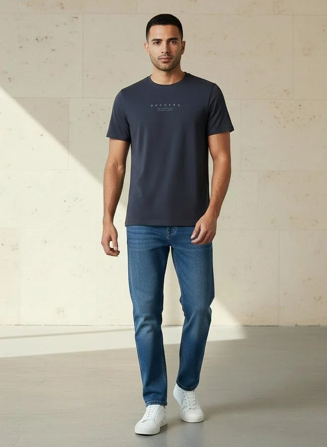 Iconic BLUE Iconic Men Slim Fit Round Neck Short Sleeve Slogan Print T shirt for Men | Best Price UAE