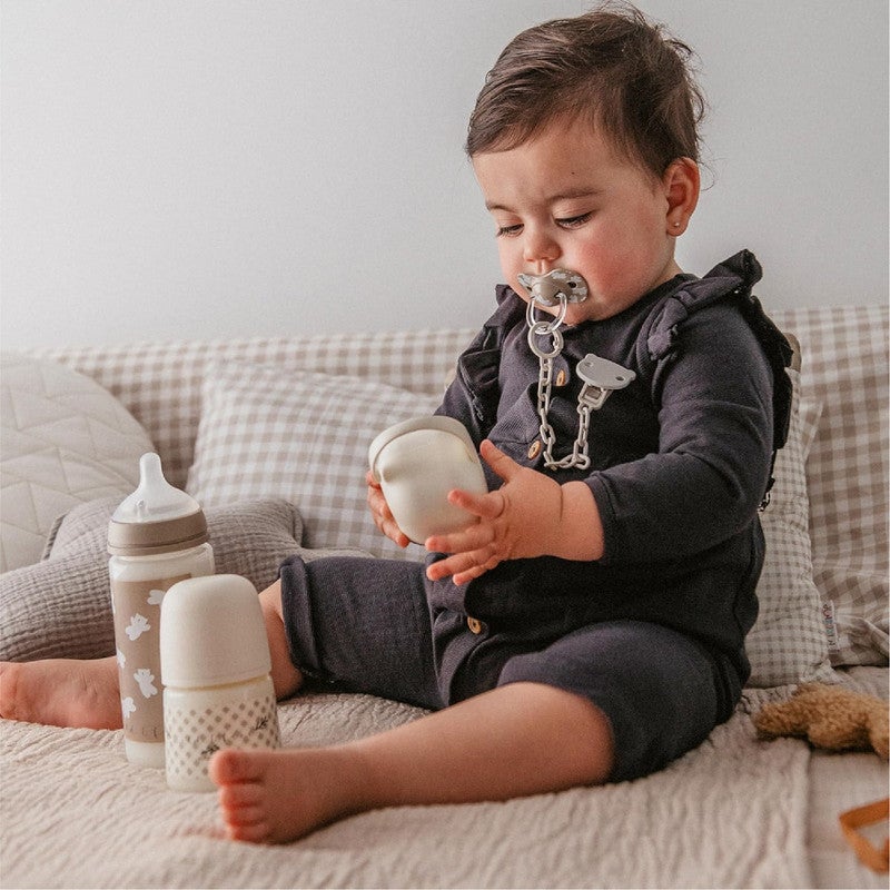 SUAVINEX مجموعة زجاجات الرضاعة للأطفال حديثي الولادة من سوفينكس، طقم هدايا يتضمن: 2 × 270 مل تدفق متوسط + 2 × 150 مل تدفق بطيء + مصاصة 0 إلى 6 أشهر، حلمات سيليكون SX Pro الفسيولوجية، 5 قطع، +0M، بيج برية ومجانية - Image 4