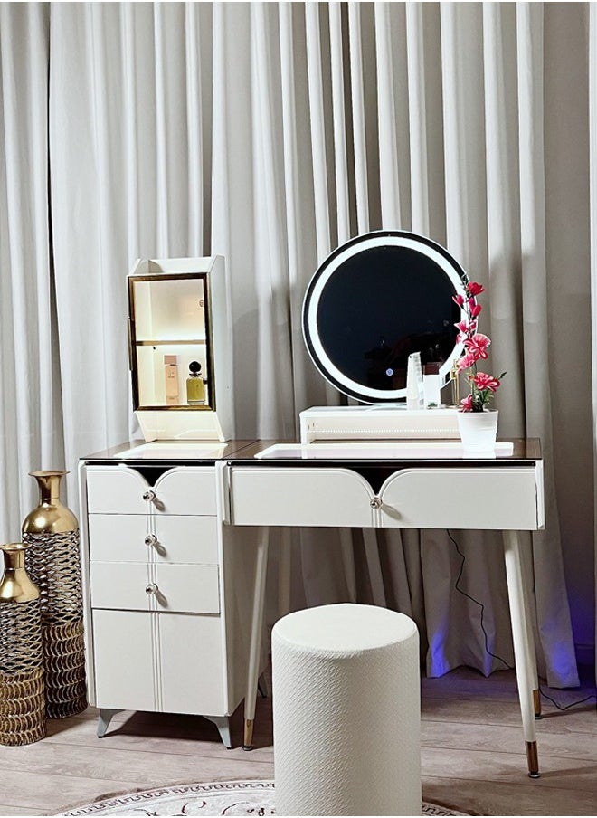 A dressing table with LED lighting and innovative storage compartments with an ergonomic chair