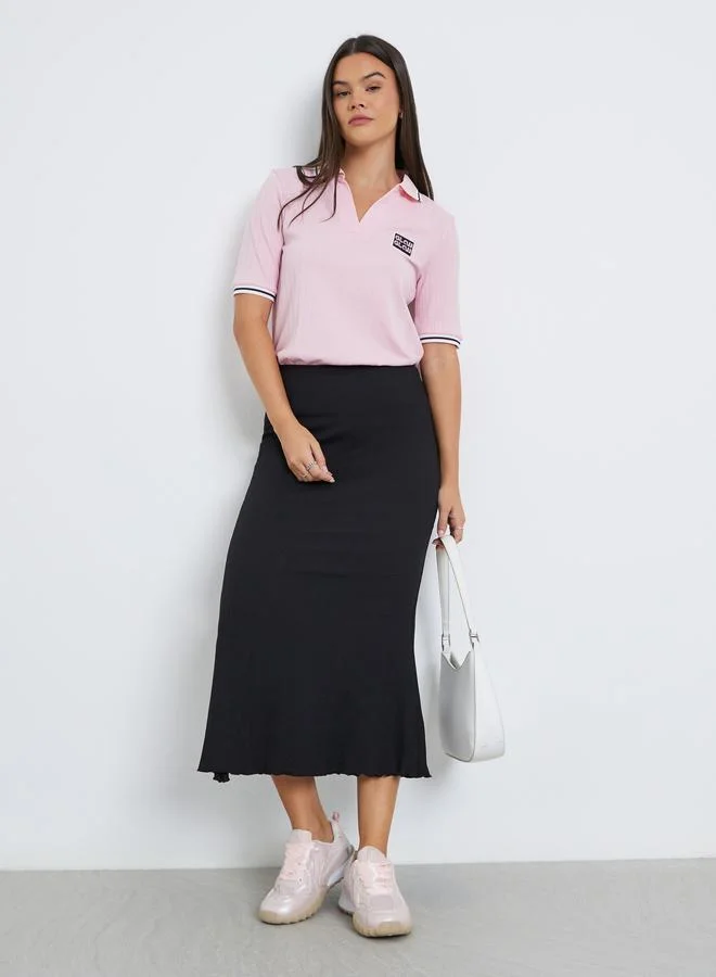 ستايلي تنورة ميدي بتفاصيل بارزة الملمس