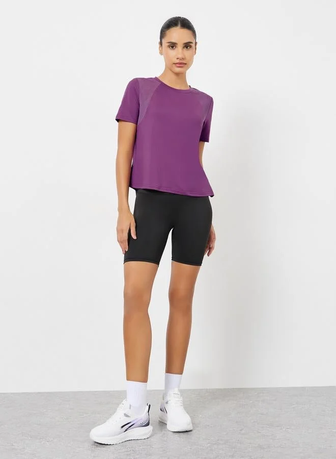 Styli Active Mesh Insert and Back Split Short Sleeve Top