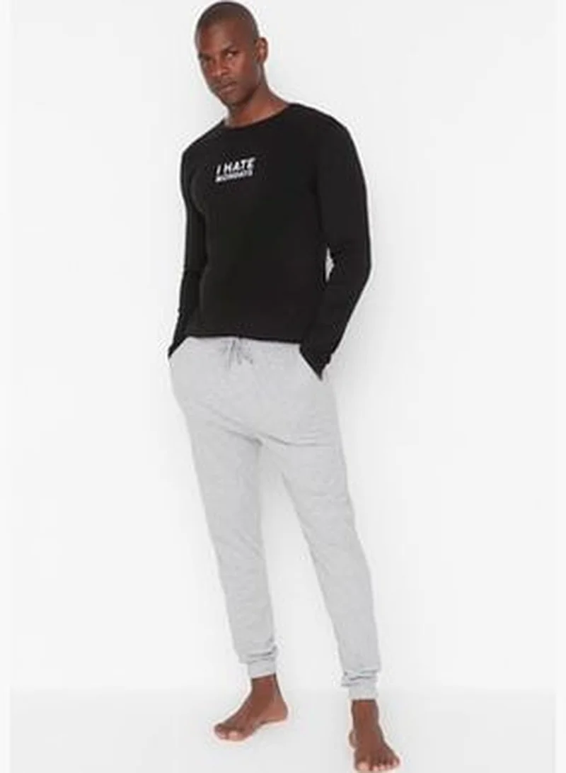 trendyol Men's Black Slogan Printed Regular Fit Knitted Pajamas Set.