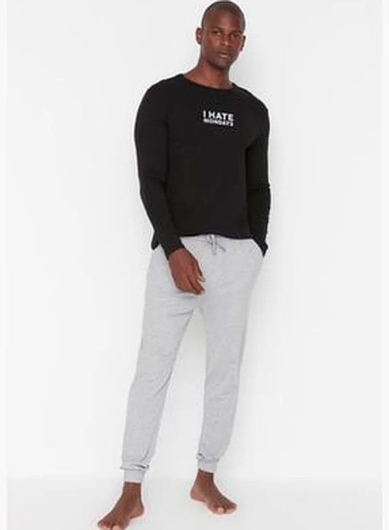 trendyol Men's Black Slogan Printed Regular Fit Knitted Pajamas Set.