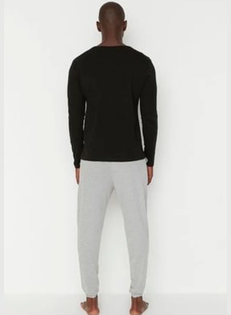 trendyol Men's Black Slogan Printed Regular Fit Knitted Pajamas Set.
