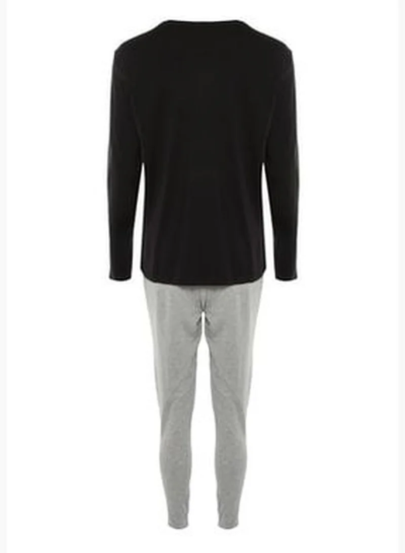 trendyol Men's Black Slogan Printed Regular Fit Knitted Pajamas Set.
