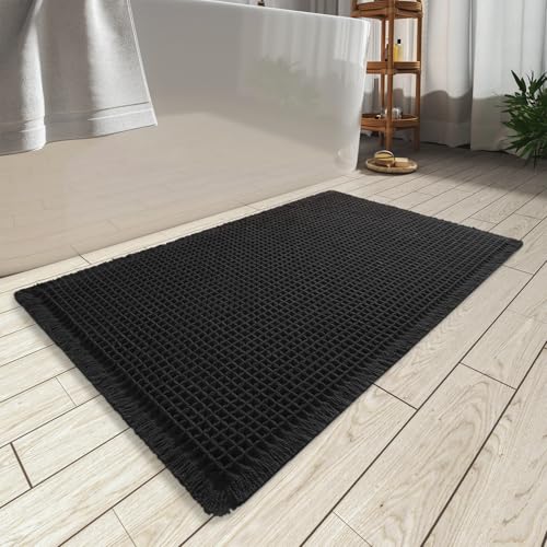 AMOAMI Upgraded Waffle Bath Mat, Super Absorbent Non Slip Bath Mats for Bathroom Floor, Machine Washable Bathroom Rugs with Tassels, Rubber Backed Bathroom Mats, Ultra Soft, 17" x 24", Black - Image 1