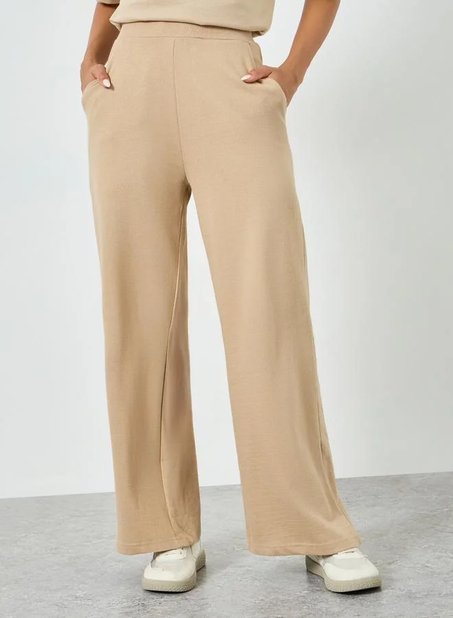 Styli Women Beige Wide Leg Joggers