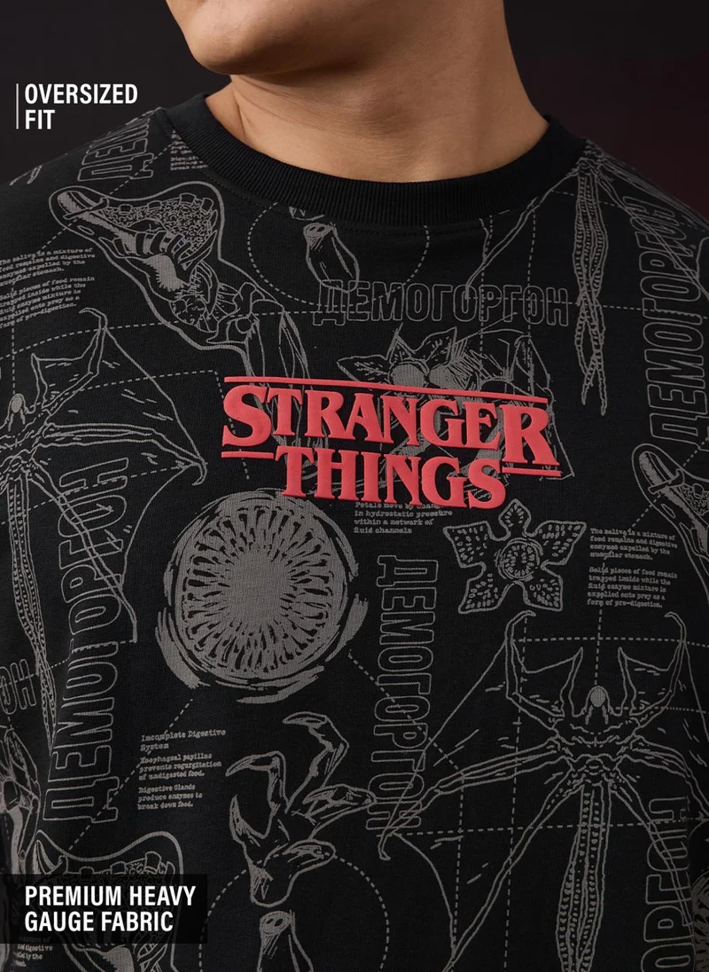 The Souled Store  The Souled Store Stranger Things: Logo Men and Boys Short Sleeves Round Neck Black Graphic Printed Monster Graphic Oversized T-Shirt for Men | Best Price UAE