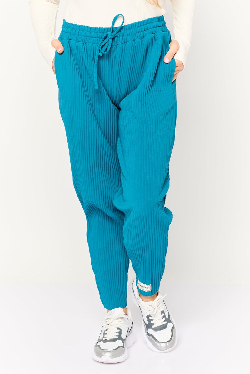 The Giving Movement Women Regular Fit Textured Tapered Pants, Teal - Image 1