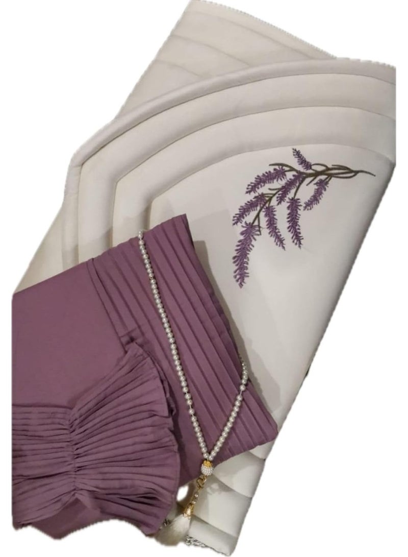 This distinctive lavender prayer set includes a prayer mat with a foam lining in the shape of a mihrab, a plain prayer robe with pleats, and an attached headscarf. One large size for women.