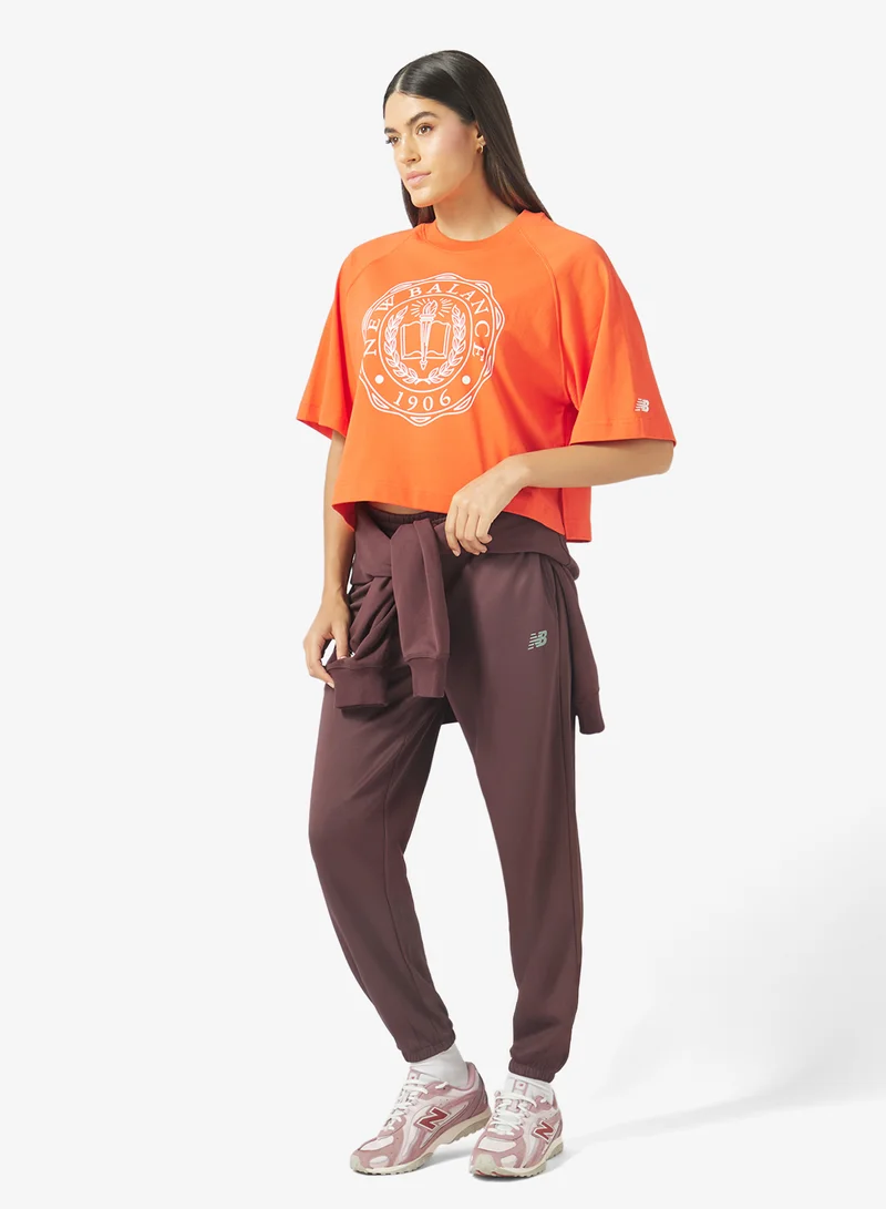 New Balance NEO FLAME (NEF) Varsity Boxy T-Shirt for Women | Best Price UAE
