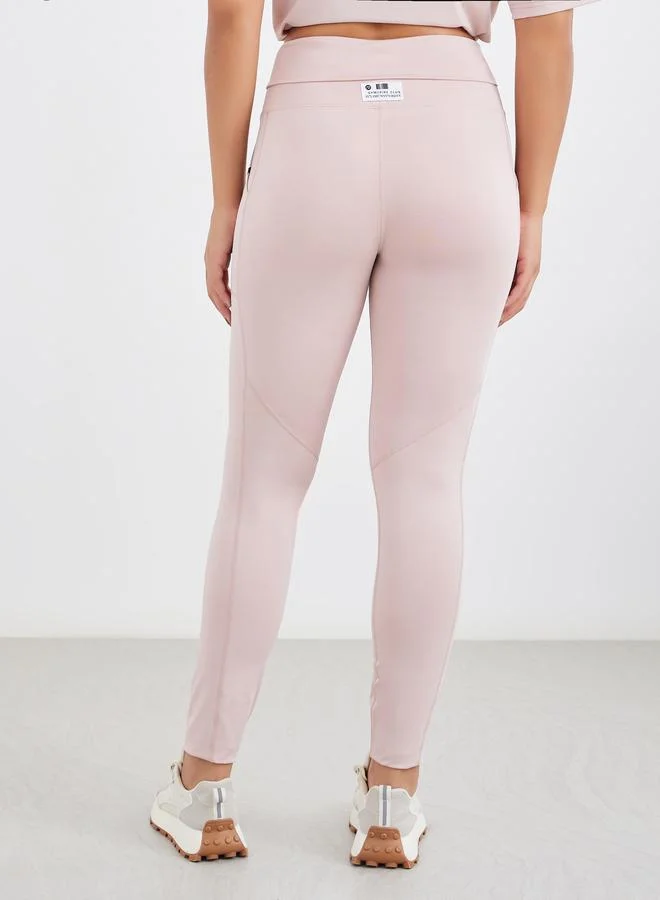 Styli Gymspire Edition - Label and Tab Back Waist Pocket Leggings