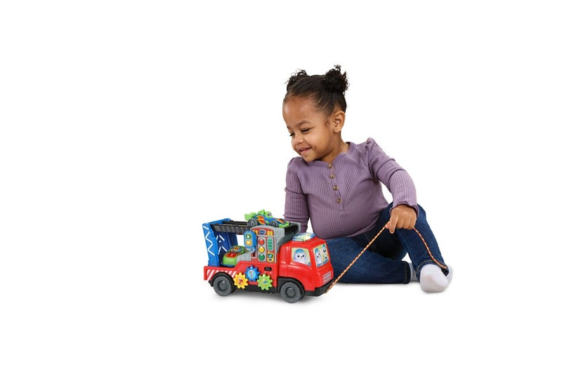 Vtech 3-in-1 Musical Car Carrier Truck Toy with Repair Center, Pull-Along Cord & 2 Race Cars for Toddlers (12–36 Months) - Image 3