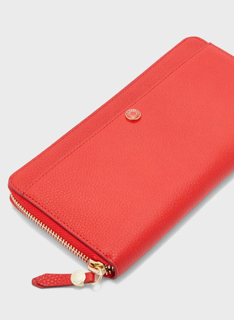 COLE HAAN Zip Through Clutch