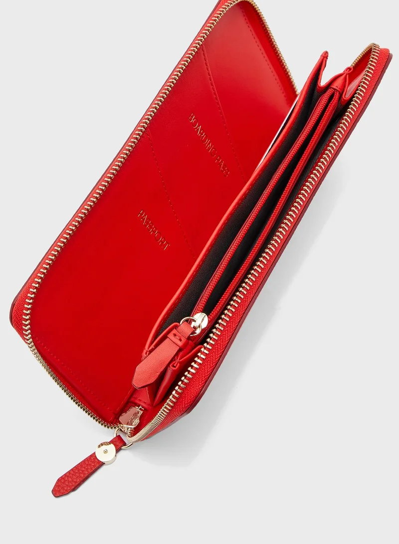 COLE HAAN Zip Through Clutch