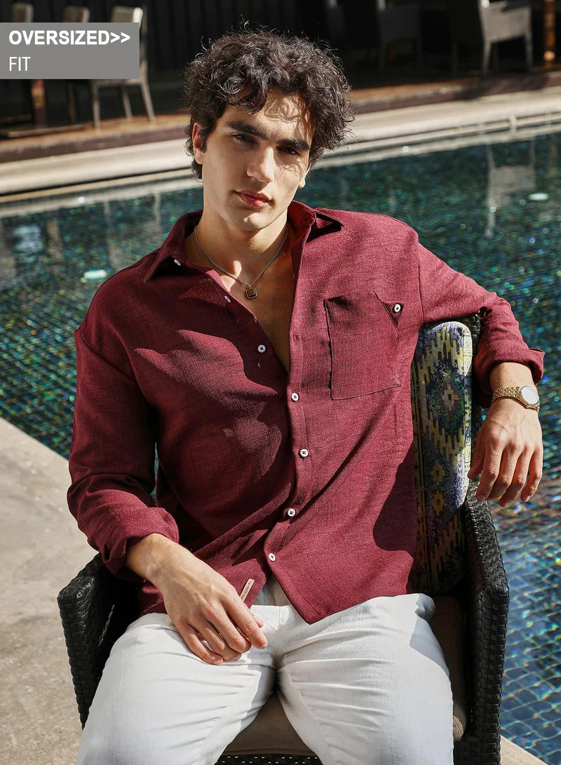 Campus Sutra Campus Sutra Men's Wine Red Modular Solid Oversized Shirt For Casual Wear | Spread Collar | Long Cuffed Sleeves | Button Closure | Oversized Shirt Crafted With Comfort Fit For Everyday Wear