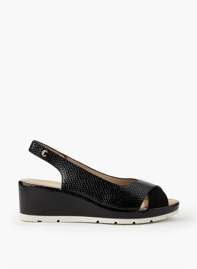 لو كونفورت صنادل بكعب إسفين بنقوش نسائية