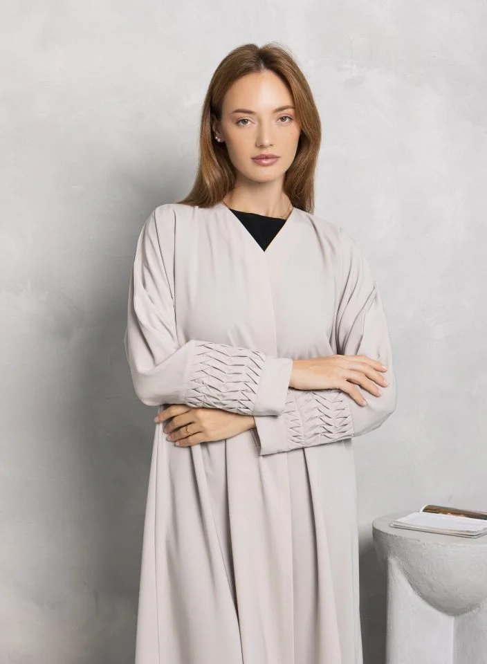 Nikias Light grey soft crepe fabric with designs on cuffs
