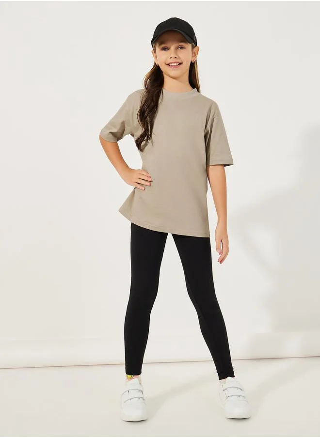 Styli Solid Round Neck Oversized T-Shirt & Leggings Co-Ords Set