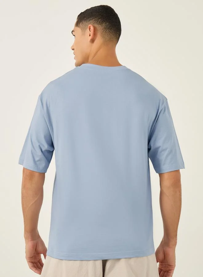 Styli Styli Men Graphic Print Shirt Sleeve Oversized T-Shirt