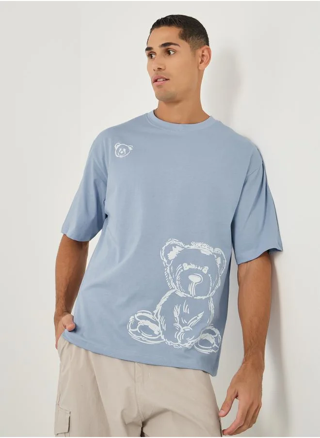 Styli Styli Men Graphic Print Shirt Sleeve Oversized T-Shirt