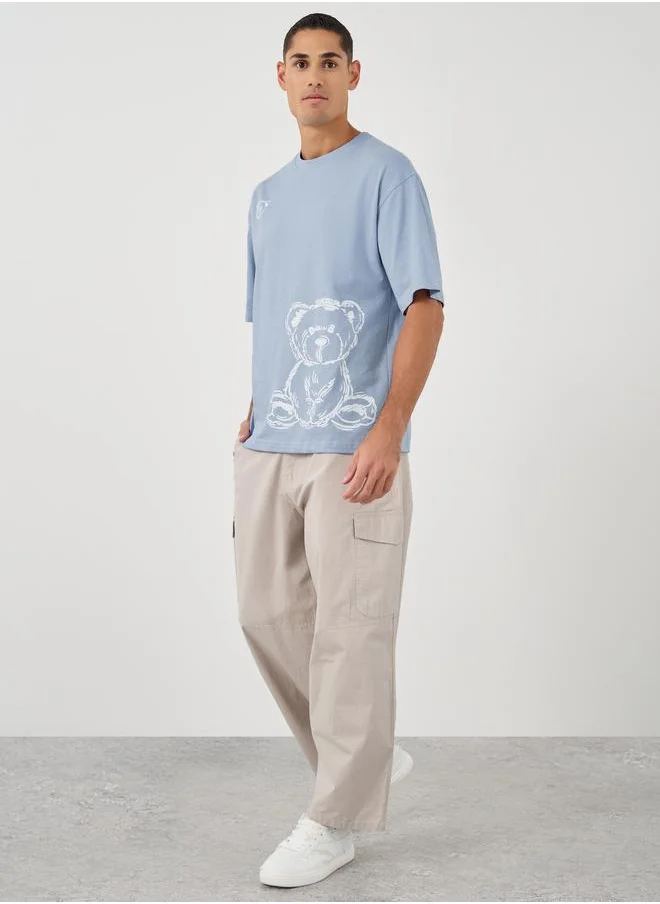 Styli Styli Men Graphic Print Shirt Sleeve Oversized T-Shirt