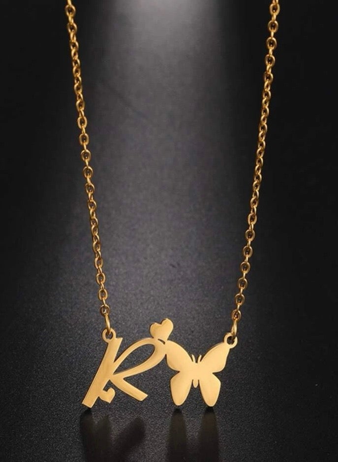 سيكستي فور سلسال نسائي مصنوع من الاستانلس ستيل مطلي باللون الذهبي بة حرف