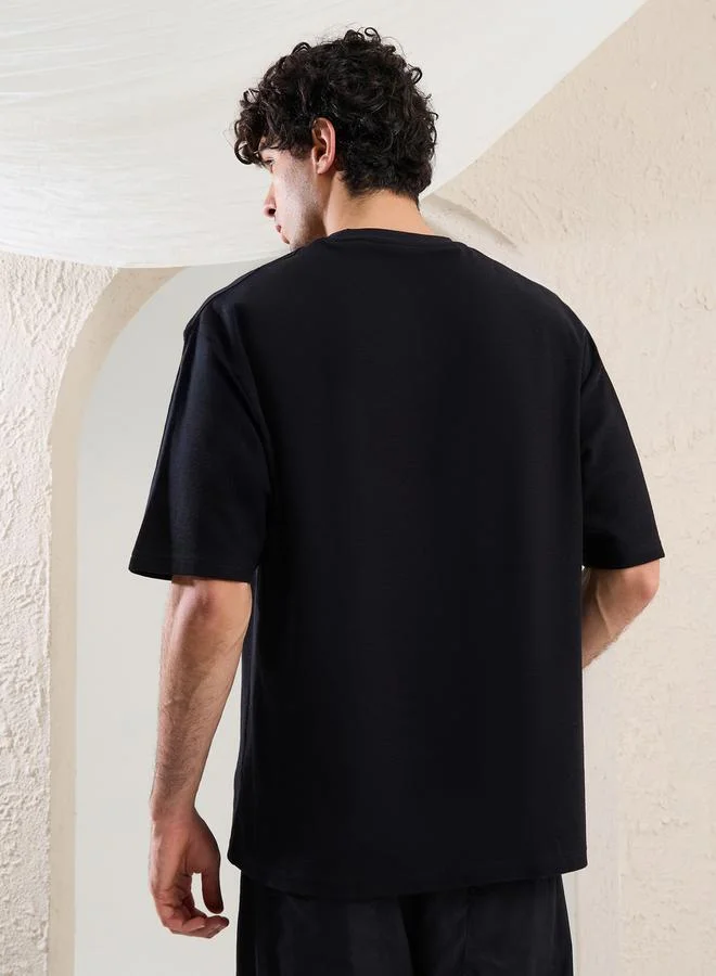Styli Slogan Embroidered Dropped Shoulder Oversized T-Shirt