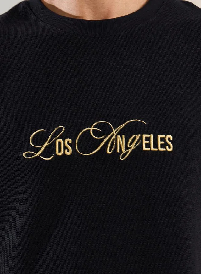 Styli Styli Slogan Embroidered Dropped Shoulder Oversized T-Shirt