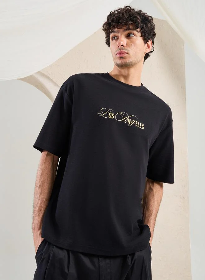 Styli Styli Slogan Embroidered Dropped Shoulder Oversized T-Shirt