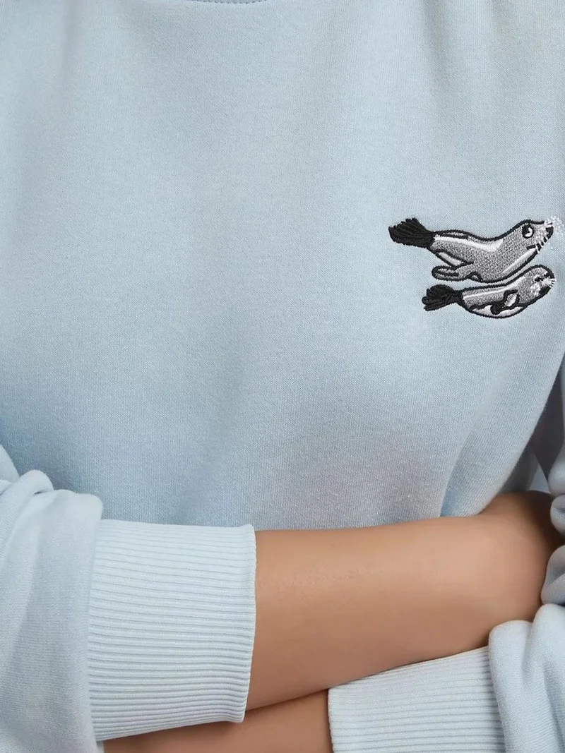 Hiccup Powder Blue Comfort Animal Pattern Embroidered Raised Crew Neck Sweatshirt for Women | Best Price UAE