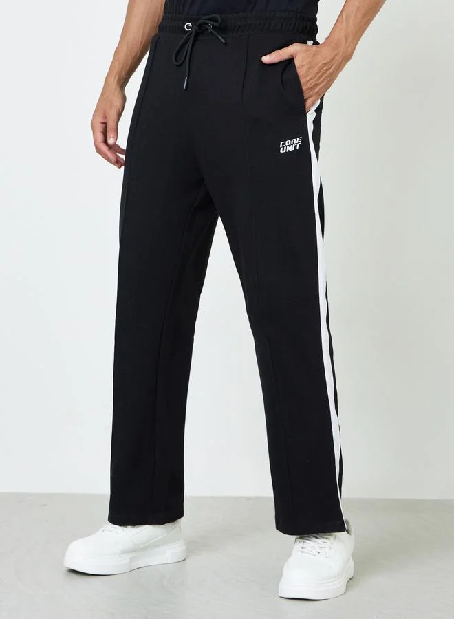 ستايلي Men Black Oversized Side Stripe Tape Detail Terry Joggers