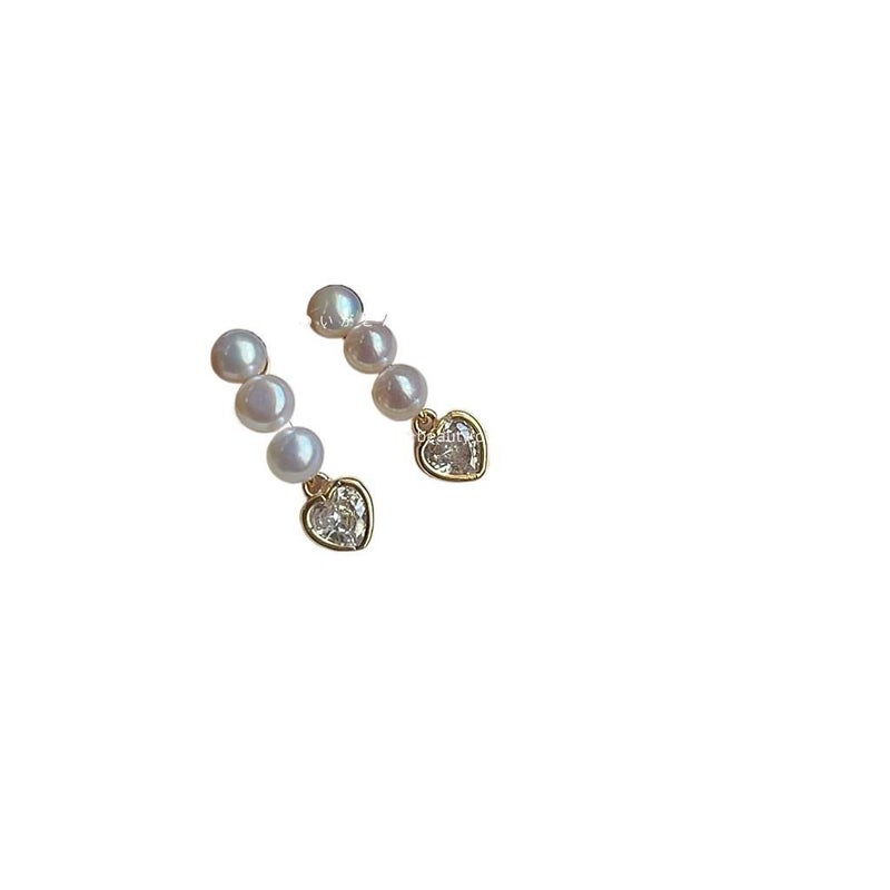 DGG Gold Pearl Earrings with Rhinestone Detail and Lightweight Huggie Profile for Daily Wear and Elegant Styling - Image 1
