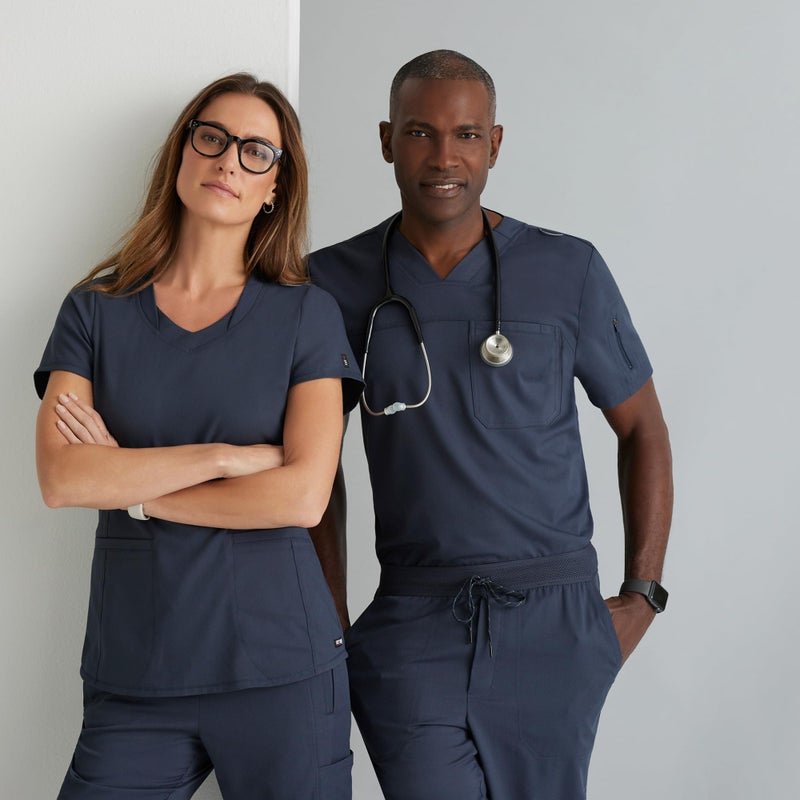BARCO Greyâ€™s Anatomy Spandex Stretch Direct Bolt Scrub Top for Women â€“ Indigo, 3-Pocket V-Neck Shirt w/Spandex Stretch, Wrinkle Release & Soil Release Fabric â€“ Medium, Regular Fit - Image 3